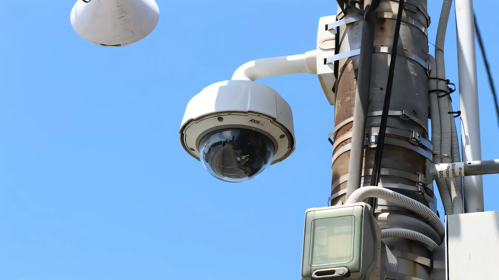 Surveillance camera mounted on utility pole