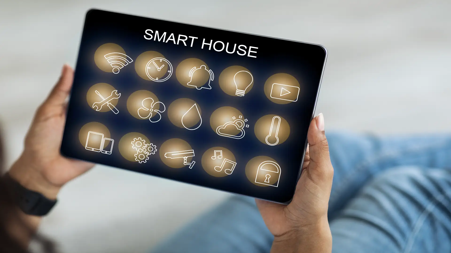 Smart home panel in woman's hands closeup