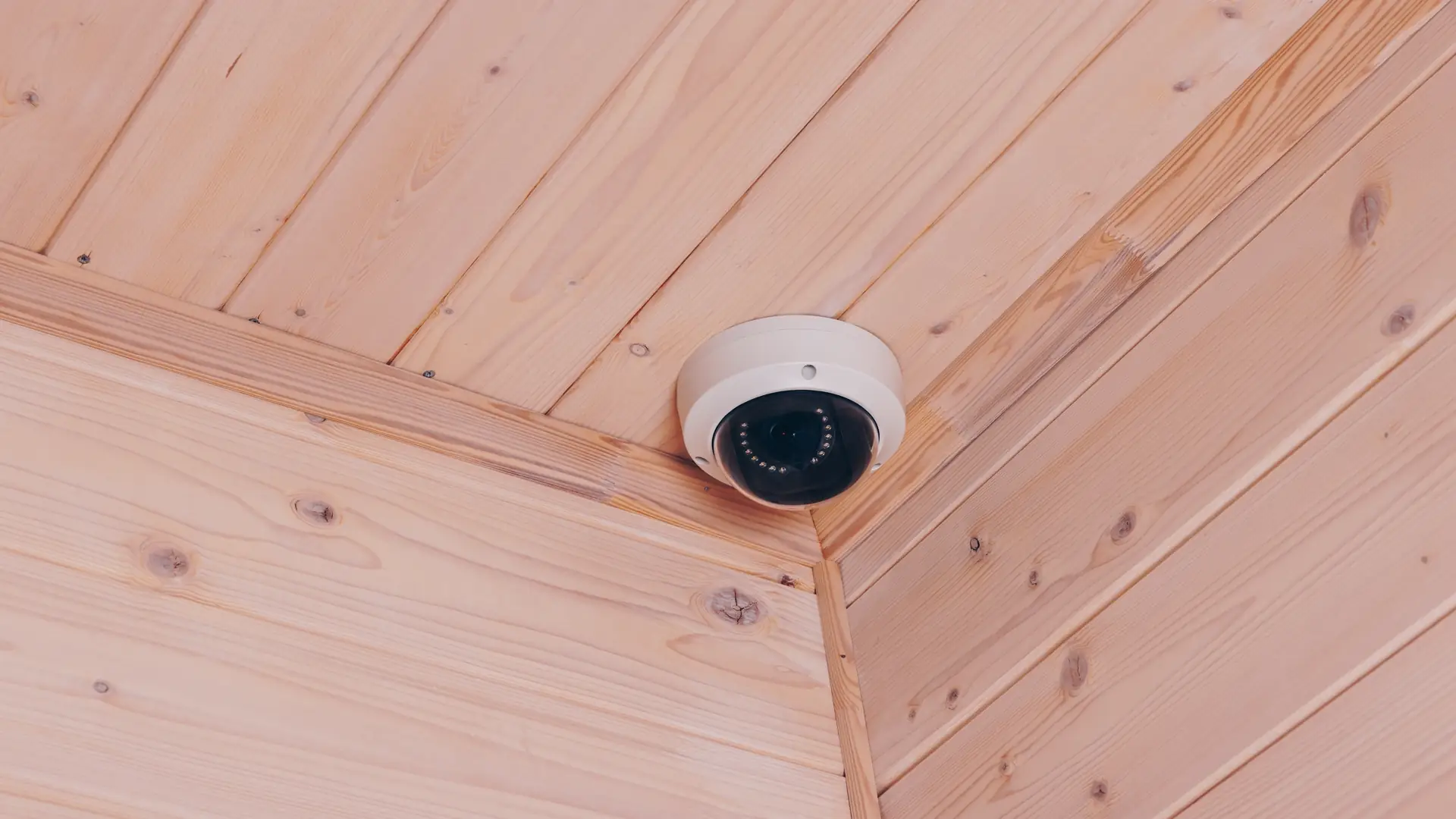 Modern AI security camera installed on Toronto home exterior